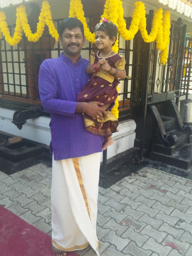 Picture of Rithika with her father. Image Credit: Dhanya Vallat
